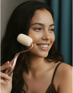 Woman using a rolli sponge on her face with a blurred background